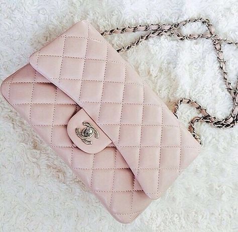 Did you know that the very first Iconic Pink Chanel Purse came out in February 1955?